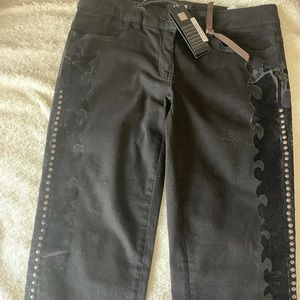 Roberto cavalli black jeans .